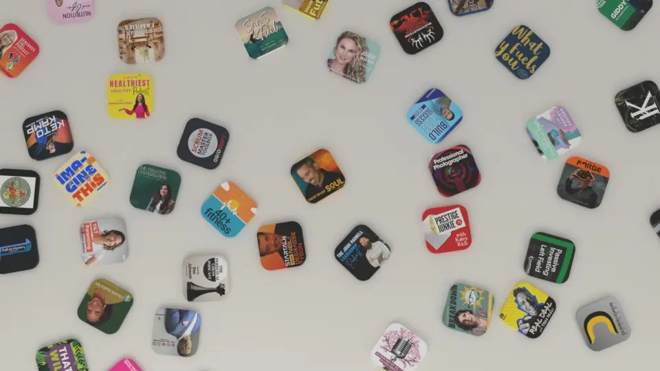 A camera moves over a table of real podcast covers. Three stand up on a green bar and each gets a card saying why it fits. A pitch letter slides to each host, follow-ups land on every thread and one host replies yes. A date goes in the calendar, a one-page brief builds itself, and the view ends in a studio on a host and a guest laughing mid-recording.